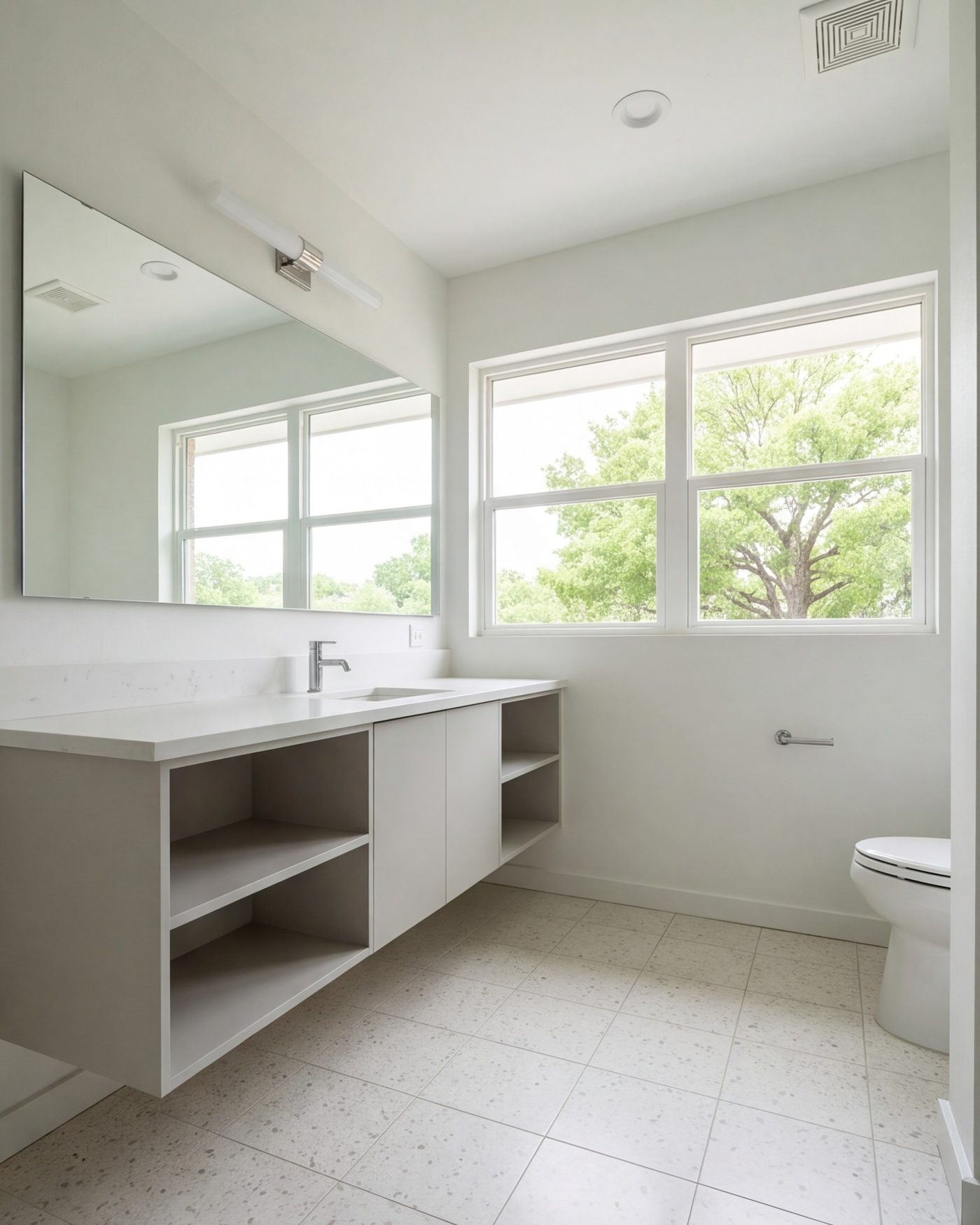 tall view of a remodeled 1960s ranch-house bathroom, open vanity wall, big window, daylight
